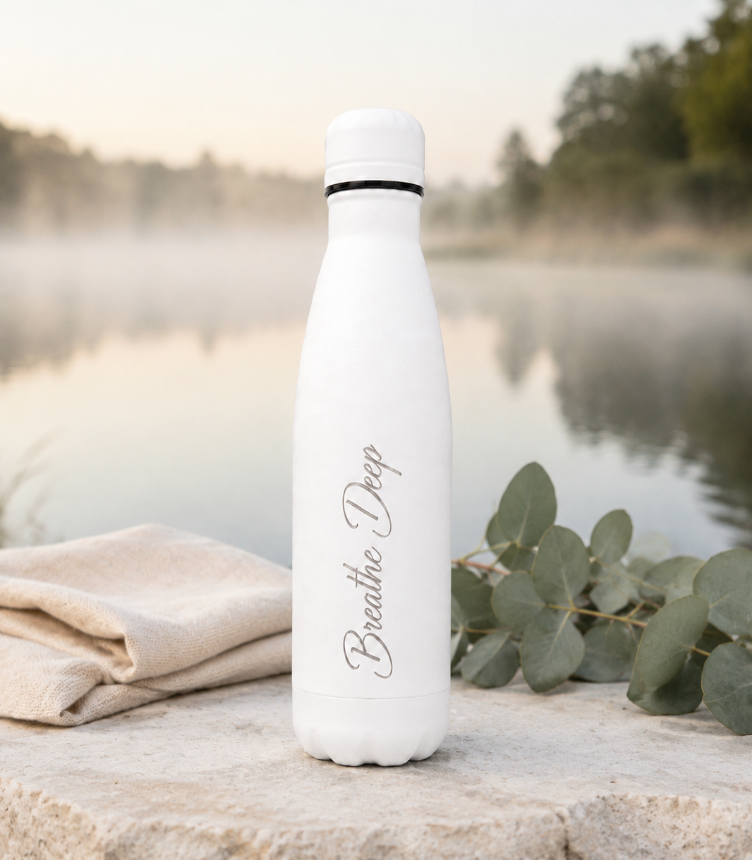 White 500ml personalised stainless steel water bottle engraved “Breathe Deep” beside a misty lakeside with eucalyptus | Willys Bottles