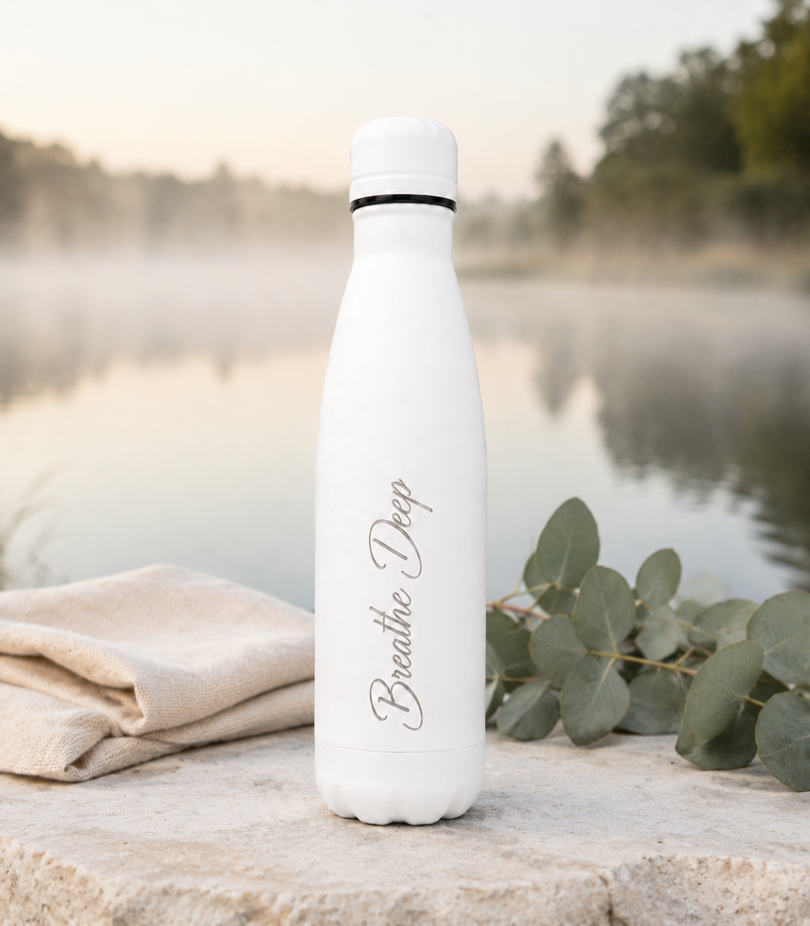 White 500ml personalised stainless steel water bottle engraved “Breathe Deep” beside a misty lakeside with eucalyptus | Willys Bottles